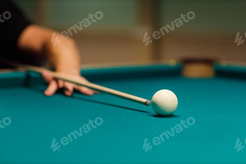 Preview: Billiard player at billard table or snooker american billiards pool sport game