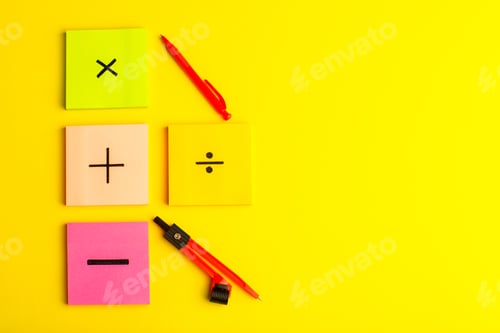 Preview: front view different signs on colorful stickers on yellow desk math color science calculation school
