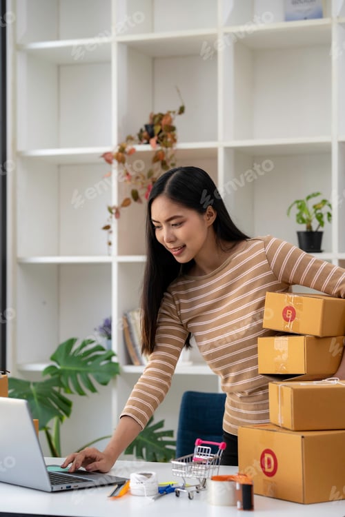 Preview: Asian business woman talking to clients on live video, selling online business. Working from home in