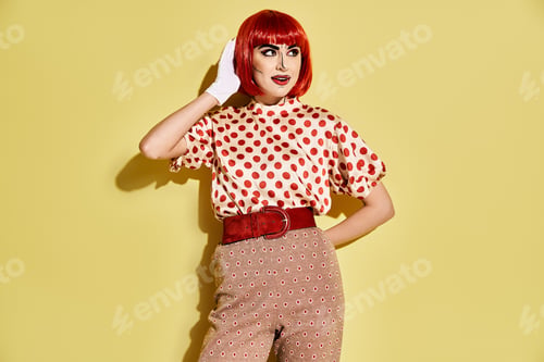 Preview: Pop art fashionista: redhead in polka dot attire