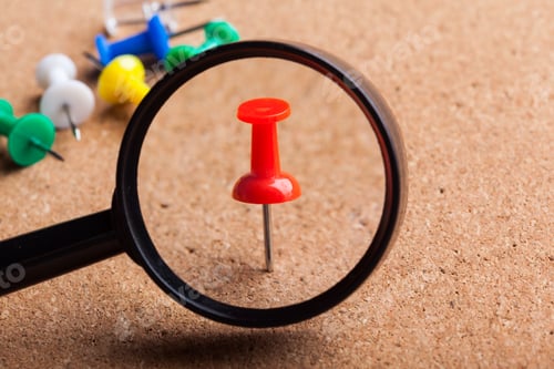 Preview: blank brown board and a magnifying glass