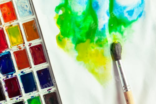 Preview: Watercolor Paints and Brush on White Background