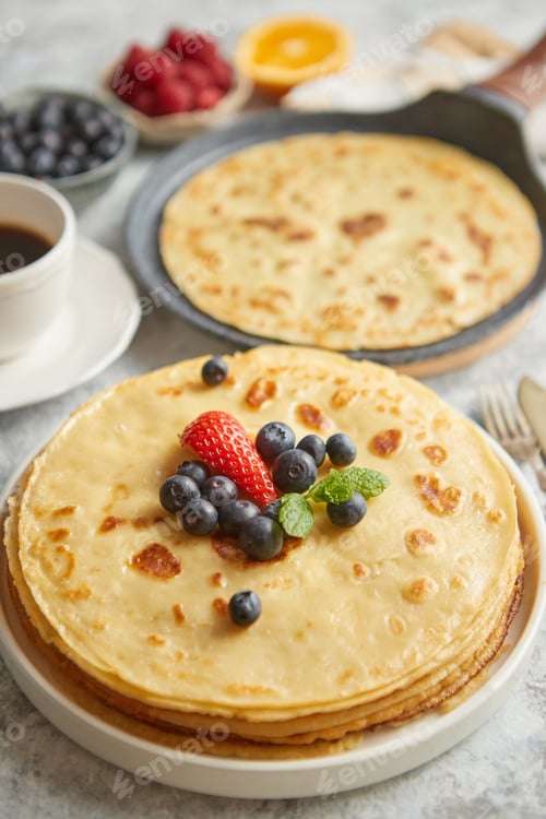 Preview: Various breakfast ingredients placed on stone table