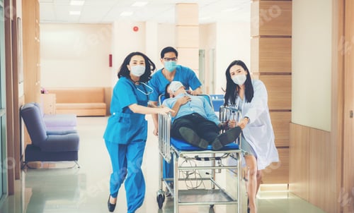 Preview: Emergency Department: Doctors and Nurses moving Seriously Injured Unconcious Patient towards