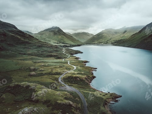 Preview: Scenic Lake and Winding Road in a Valley