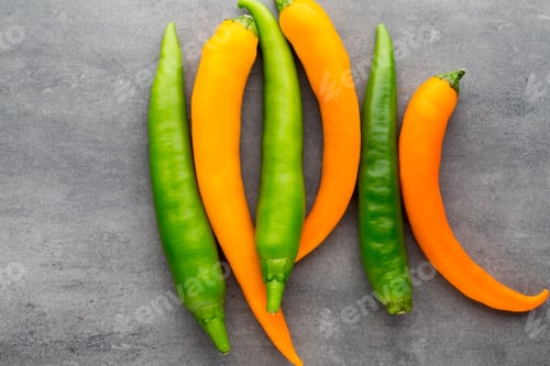 Preview: Chilli pepper on the grey background.