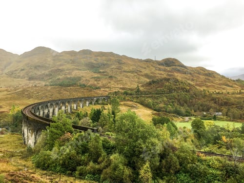 Preview: Highlands in autumn. Harry Potter train hogwarts express bridge in Scotland
