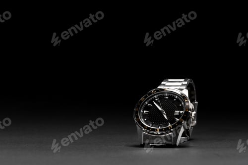 Preview: Silver Wristwatch on Dark Background Shows Luxury Time