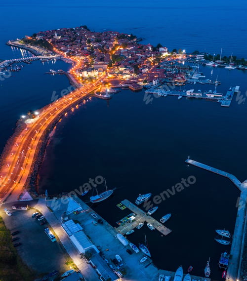 Preview: Aerial view to a sea town at night