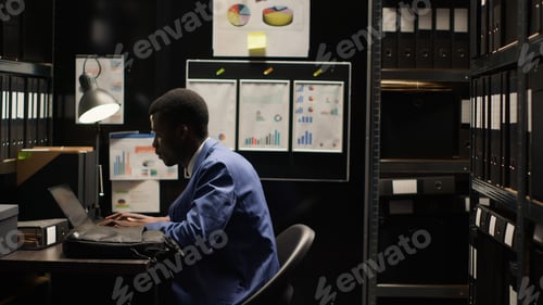 Preview: Police officer places laptop bag on desk