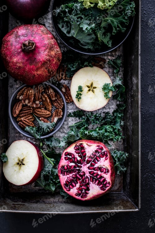 Preview: Fresh pomegranate with apples and pecans food photography