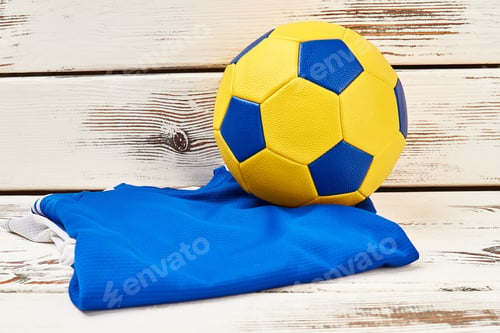 Preview: Soccer ball and folded uniform