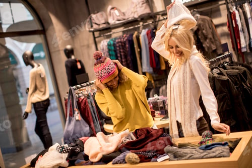 Preview: Two young women choosing winter clothes