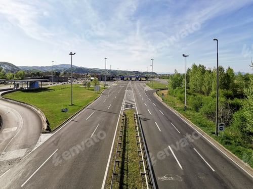 Preview: Empty three lane motorway during covid epidemic and travel restrictions.