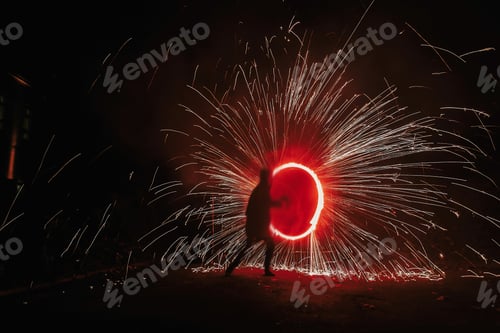Preview: Fire dancers swing, spinning red fire and man juggling with bright sparks