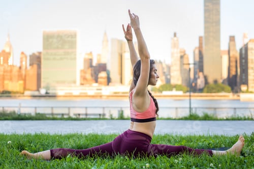 Preview: Woman doing yoga in a park