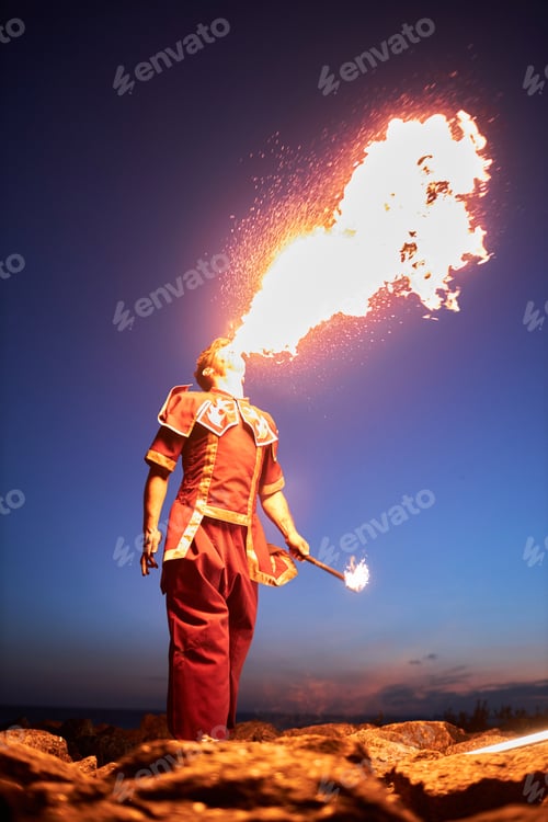 Preview: Man breathing fire performing outdoors