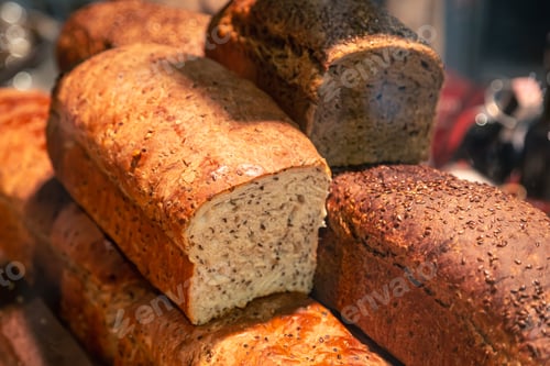 Preview: Set of breads stored for sale and consumption in supermarket.