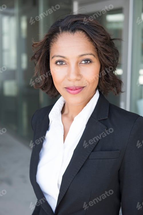 Preview: Professional Woman Posing in Business Attire