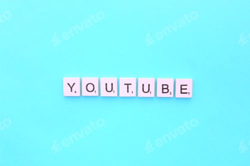 Preview: YouTube scrabble letters word on a light blue background