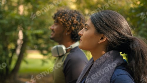 Preview: Indian man sportsman Arabian woman sportswoman trainer instructor friends runners sporty girl guy