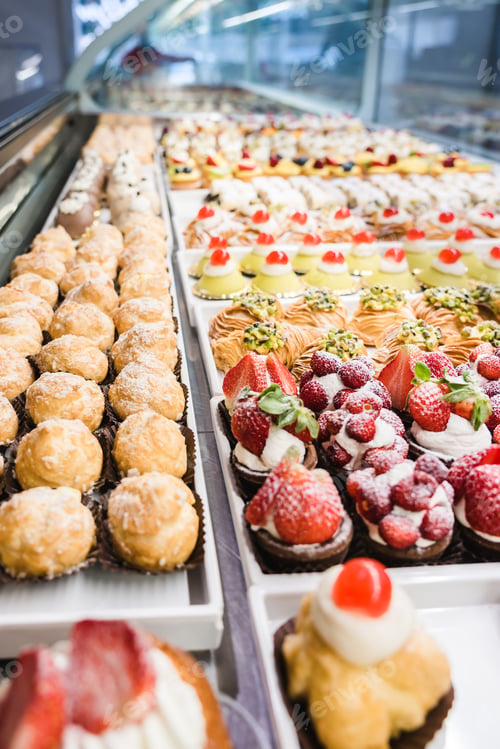 Preview: Italian Bakery counter, Window of desserts at a pastry shop. Fresh and tasty products