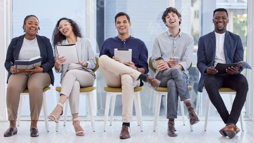 Preview: Full length shot of a diverse group of businesspeople sitting in the office and waiting