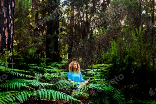 Preview: Beautiful adult lady do mindfulness exercises and yoga