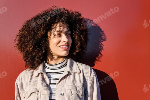 Preview: portrait of latin woman on a red background