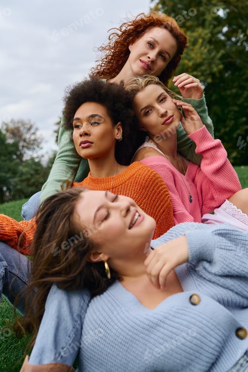 Preview: Confident women celebrate spring season in stylish outfits during an outdoor gathering in the park