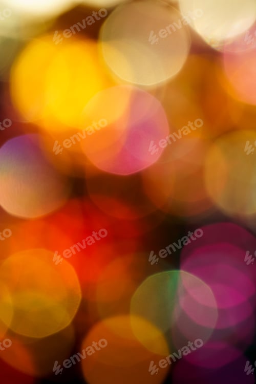 Preview: Closeup of city lights at night in background with colored neon lights, blurred focus