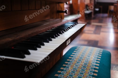 Preview: Keyboard of a small organ in a church.