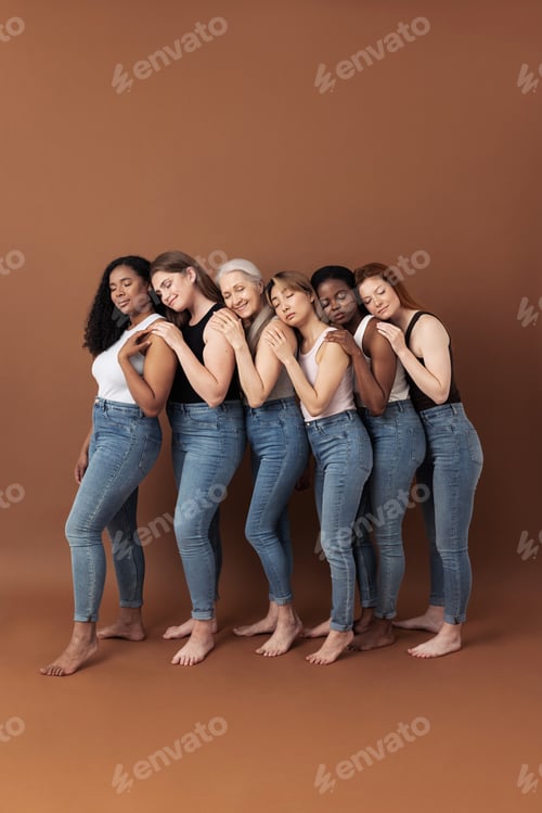 Preview: Six multiracial females in casuals hugging together