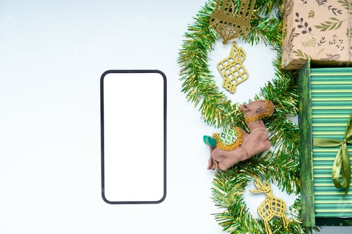 Preview: Flat Lay Of Gift Box, Islamic Decoration And Smartphone With White Blank Screen For Mockup