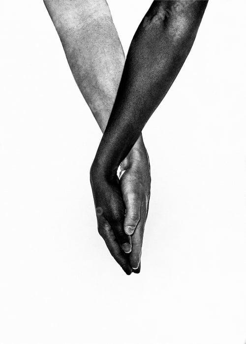 Preview: Two interracial hands holding each other in a loving way