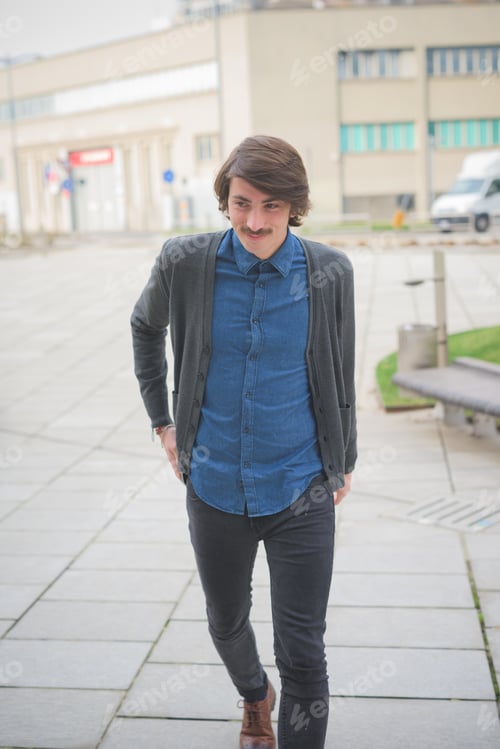 Preview: Young handsome caucasian man with moustache