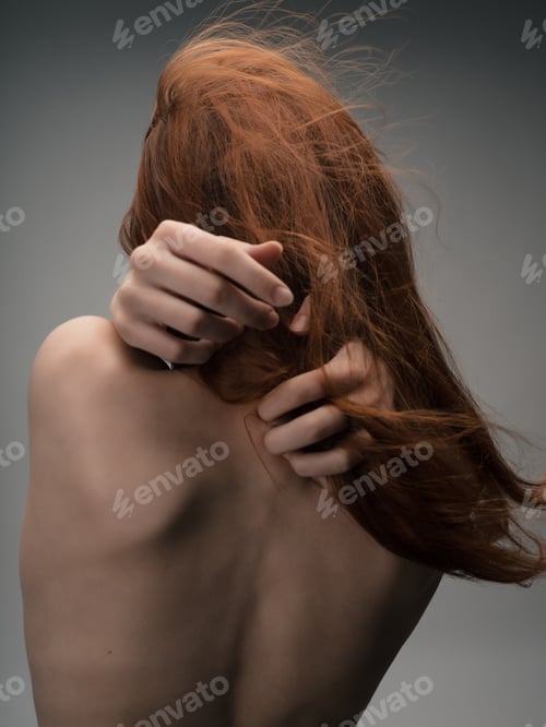 Preview: woman with bare shoulders posing red hair isolated background
