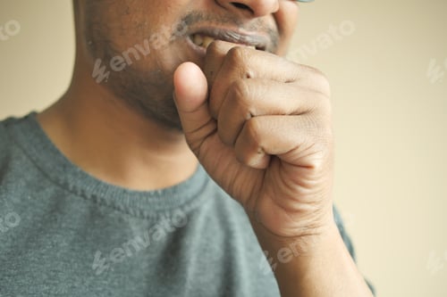 Preview: young sick man coughing and sneezes