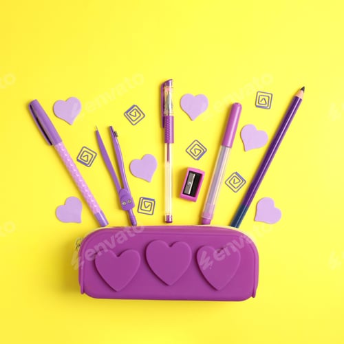 Preview: Purple pencil case and stationery on yellow background, flat lay