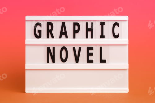 Preview: The word graphic novel on lightbox isolated pink background. Literary Genres