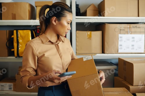Preview: Woman Checking Barcode On Parcel