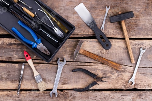 Preview: Vintage hand tools on rustic background.