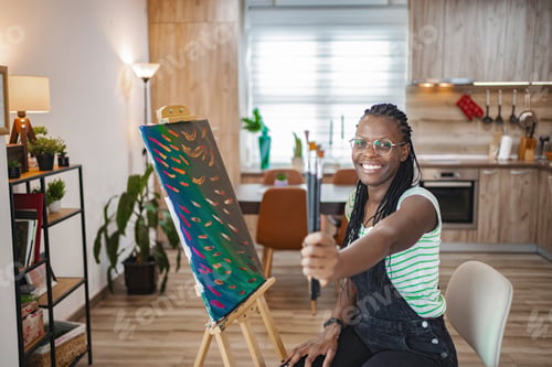 Preview: Joyful artist creating in a vibrant kitchen studio