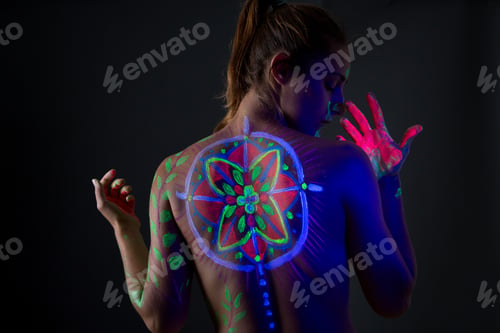 Preview: Topless model in neon lights