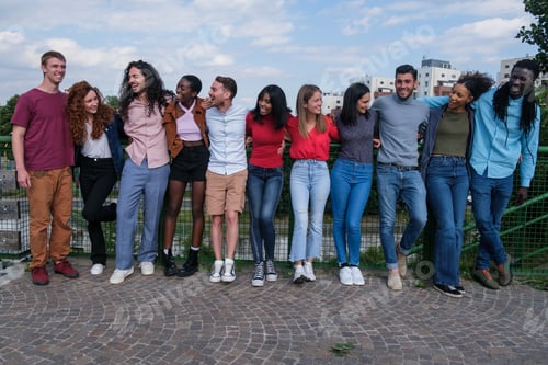 Preview: Group of friends with multicultural origin spending an afternoon together outdoors - lifestyle