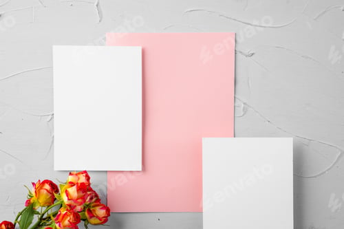 Preview: Top view of a pink paper letter and flowers with copy space
