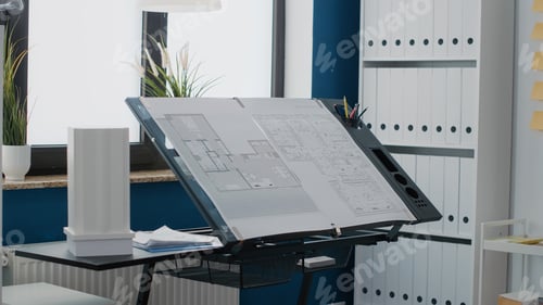Preview: Close up of blueprints plans to design building layout on table in workplace