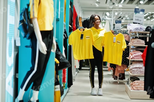 Preview: African woman shopping day.