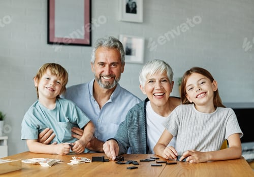 Preview: Grandparents Play Dominoes with Grandchildren at Home