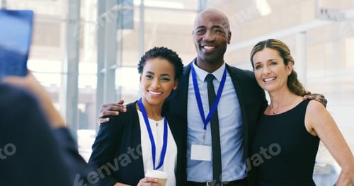 Preview: Happy, business people and hug with team for picture, photography or memory at convention or worksh